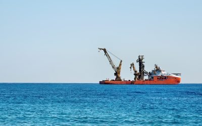 Working ship sailing near the coast of Cyprus